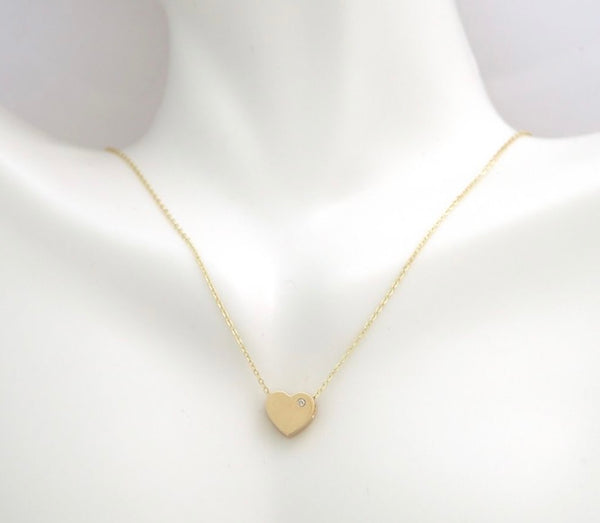 Yellow Gold Heart Necklace, accented with a natural diamond